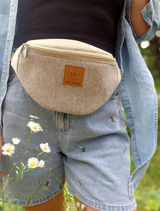 saszetka nerka Nerka damska z nubuku i plecionki Beżowa